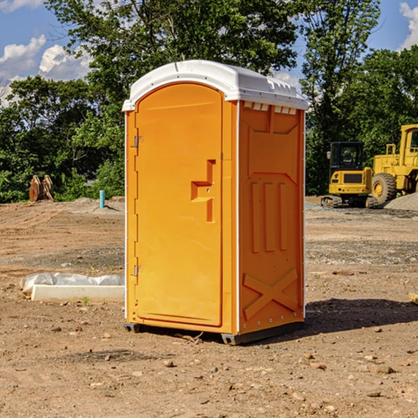 what is the cost difference between standard and deluxe portable restroom rentals in Bolckow MO